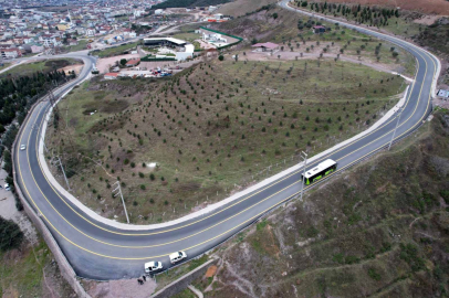 İlimtepe yoluna uzun ömürlü asfalt  ve sarı yol çizgisi